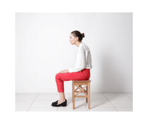 Woman sitting with forward head posture